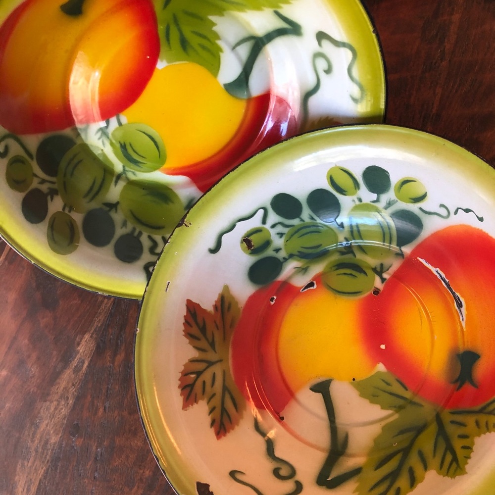 Two vintage enamel bowls